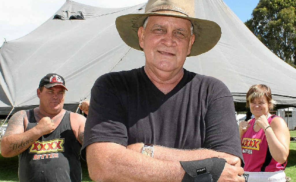 Fred Brophy (middle) with members of his boxing troupe Butterbean and The Beaver, who are preparing to fight at the Warwick Show tomorrow night.